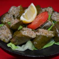 Stuffed Grape Leaves · Grape leaves stuffed with rice, fresh parsley and mint.