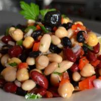 Piyaz · White beans, red beans, red pepper, green pepper, parsley, red onion and chickpeas marinated...