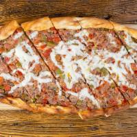 Filet Mignon Pide · A special pide topped with chopped filet mignon green peppers, red Holland peppers, tomatoes...
