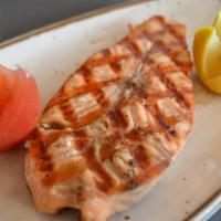 Salmon On Skewers · Cubes of char-grilled salmon. Served with salad and rice.