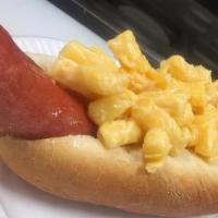 Mac And Cheese Dog · Our Deep fried pork/beef hot dog topped with Mac and Cheese