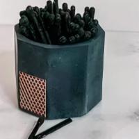 Black Matchstick Holder · Each match stick holder is hand-poured concrete with a cork bottom to protect your surfaces....