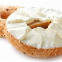 Plain Bagel With Cream Cheese · Fresh homemade plain bagel smothered with cream cheese.