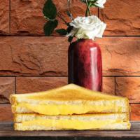 Ny'S Best Grilled Cheese · Melted American cheese between two slices of buttery grilled bread.