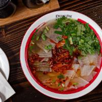 Signature Lanzhou Beef Noodle 兰州牛肉面 · Slices of beef tendon, radish, scallion, cilantro, in prime beef broth, and house special ch...