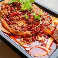 Dun Huang Grilled Fish · Spicy. Hot and spicy whole grilled fish with potato, onion, tofu and celery.（the dish is not...