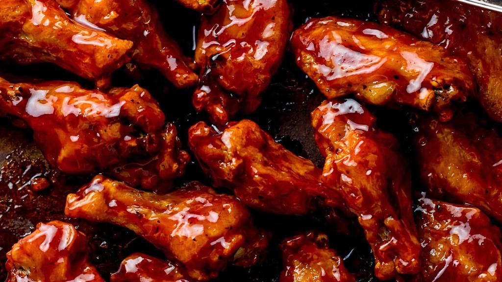 Honey Bbq Wings · Fried chicken wings tossed in our house honey bbq sauce