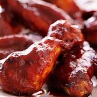 Hot Honey Wings · Fried chicken wings tossed in our homemade hot honey sauce