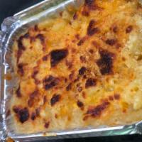Mac & Cheese · Elbow macaroni tossed in our house made cheese sauce and baked with crispy shredded cheese o...