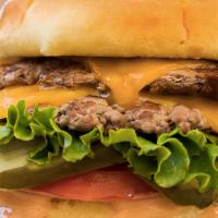 Organic Beef Burger · Organic grass fed antibiotic & hormone free hand formed patty