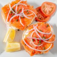 Bagel With Sliced Nova And Cream Cheese · Add sliced tomato and onion for an additional charge.