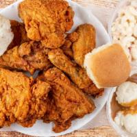 Six Piece Mixed Chicken Combo · Combo served with two sides, one roll and one biscuit.