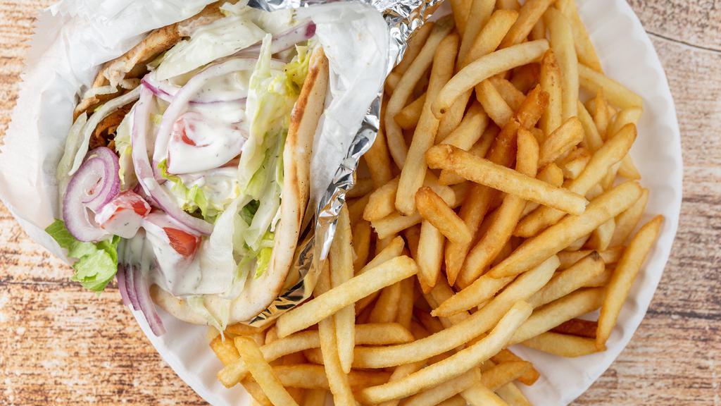 Chicken Gyro Combo · Served with fries and soda.