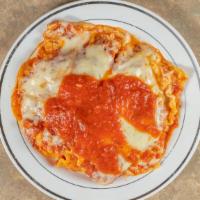 Baked Lasagna · Layered dish with wide flat pasta.