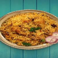 Chicken Dum Biryani · chicken, yogurt, herbs, and spices and then cooked with rice over a low flame.