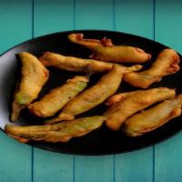 Cut Mirchi Pakora · green chilies stuffed with spicy boiled potatoes and dipped in besan flour batter(gram flour...