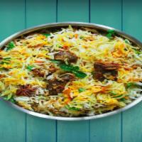 Goat Dum Biryani · goat, yogurt, herbs, and spices and then cooked with rice over a low flame.