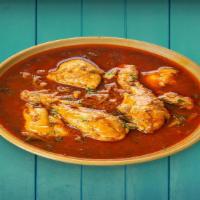 Chicken Curry · chicken marinated in an onion and tomato gravy flavored with ginger, garlic, and chilies