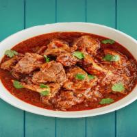 Lamb Vindaloo · spicy tender lamb made with coconut, vinegar and lots of hot red chilli peppers
