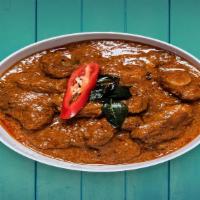 Lamb Madras · distinctly hot curry, originating from the southern part of India using the famous madras sp...