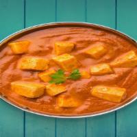 Paneer Butter Masala · cubes of cottage cheese steamed in a rich, creamy tomato sauce