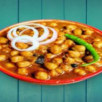 Channa Masala · chickpeas and tomatoes simmered with onions, ginger, and garlic