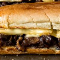 Original Philly Cheesesteak · Thinly sliced steak with your choice of condiments stuffed in between fresh baked bread.