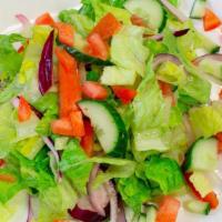 Tossed Salad · Romaine lettuce, tomatoes, cucumbers, red onions & dressing.