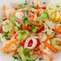 Seafood Salad · Shrimp, calamari, red onion, oregano, virgin olive oil.