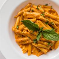 Penne Alla Vodka · Penne in a pink sauce with vodka.