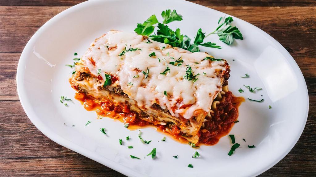Lasagna · Ground beef, ricotta & Mozzarella.