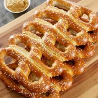 20 Real Pretzels · Hand-twisted. Fresh-baked. Always delicious.
