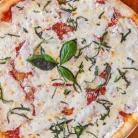 Margherita Pizza · Fresh plum tomato sauce, fresh mozzarella, fresh basil and Romano.