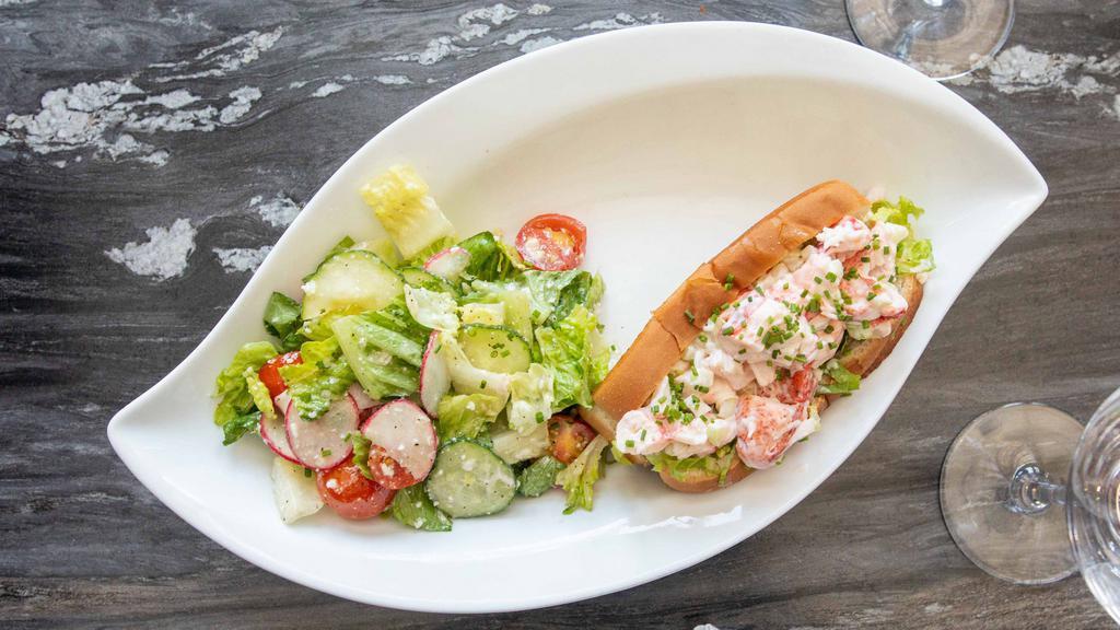 Classic Maine Lobster Roll · maine lobster meat, lemon, celery, aioli, served on a toasted brioche roll with hand cut fries OR house salad