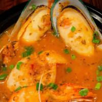 Cioppino · A hearty San Francisco style fisherman's stew with crab, shrimp, clams, mussels, and fish!.