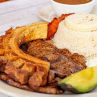 Bandeja Paisa. · Colombian typical dish
red beans, rice, avocado, corn patty, egg, fried pork, sausage, sweet...