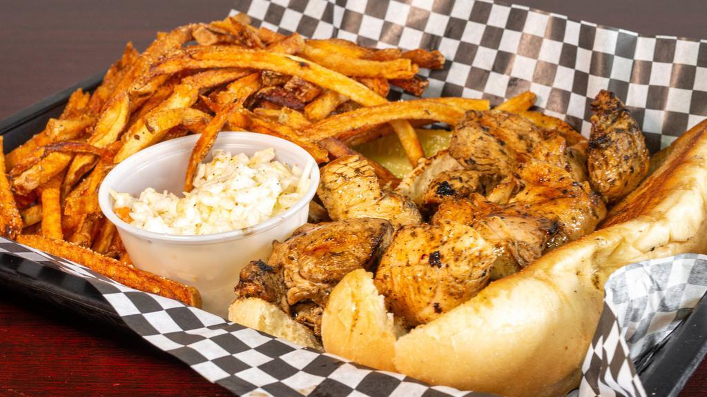 Chicken Spiedie · A Southern Tier favorite prepared in authentic Endicott style. Large chunks of chicken, marinated in Spiedie sauce and cooked perfectly. Served on a sub roll with fries and a side of mac salad.