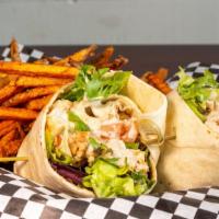 Chicken Caesar Wrap · Seasoned and grilled chicken breast tossed with mixed greens, Caesar dressing, tomato and Pa...