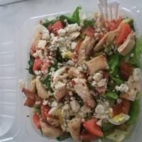 Cobb Salad · Romain lettuce, tomato, bacon, chicken, avocado, chives and topped with blue cheese.