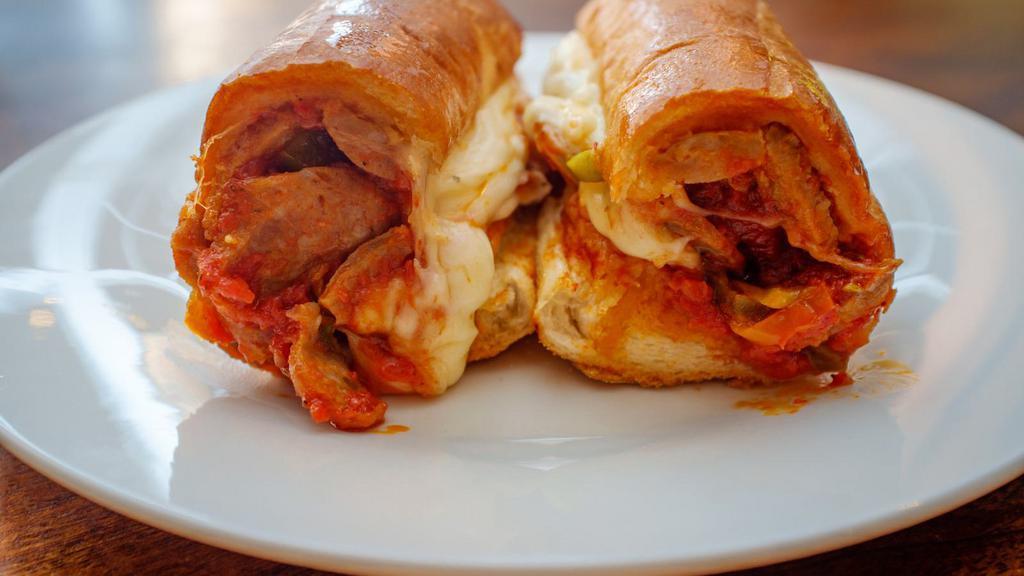 Sausage Parmigiana Hero Sandwich · Hot Hero sandwich made with Sausage, Parmesan cheese, and marinara sauce.