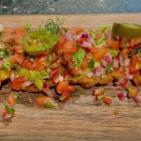 Tostones · Homemade Tostones Served With Guacamole, Pico De  Gallo, In-House Pickled Jalapenos And Cila...