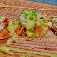 Tostaditas Borrachas De Pulpo · Homemade Corn Tostadas, Sauteed Octopus With Tequila, Chipotle Sauce, Sauteed Onions, Lettuc...