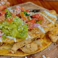 Pollo Quesadilla · Grilled Chicken, Oaxaca Cheese, Topped With Sour Cream, Homemade Guacamole, Pico De Gallo, C...