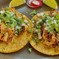 Carnitas Taco · Confit Pork, Onion, Cilantro