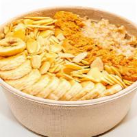 Protein Power Steel-Cut Oatmeal · Organic steel-cut oatmeal, bananas, almonds, cashew butter, & raw honey