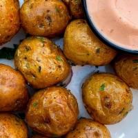 Papa Criolla Appetizer · Colombian Baby potatoes served w/ salsa rosada dipping sauce