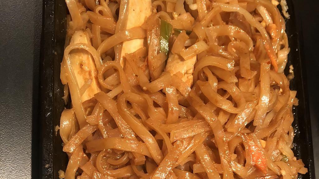 Pad Thai Noodles · Hot and spicy. Flat rice noodles sautéed in a light spicy-sweet sauce with browned tofu, bean sprouts, scallions, and crushed peanuts.
