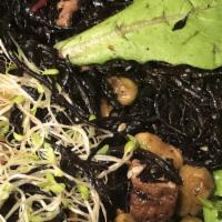 Hijiki Salad · Marinated black seaweed with edamame peas.