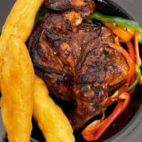 Jerk Chicken · Served with rice and peas or white rice and steam veggies or garden salad.
