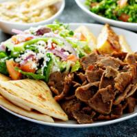 Lamb Gyro · Perfectly grilled Lamb gyro meat served in customer's choice of style.